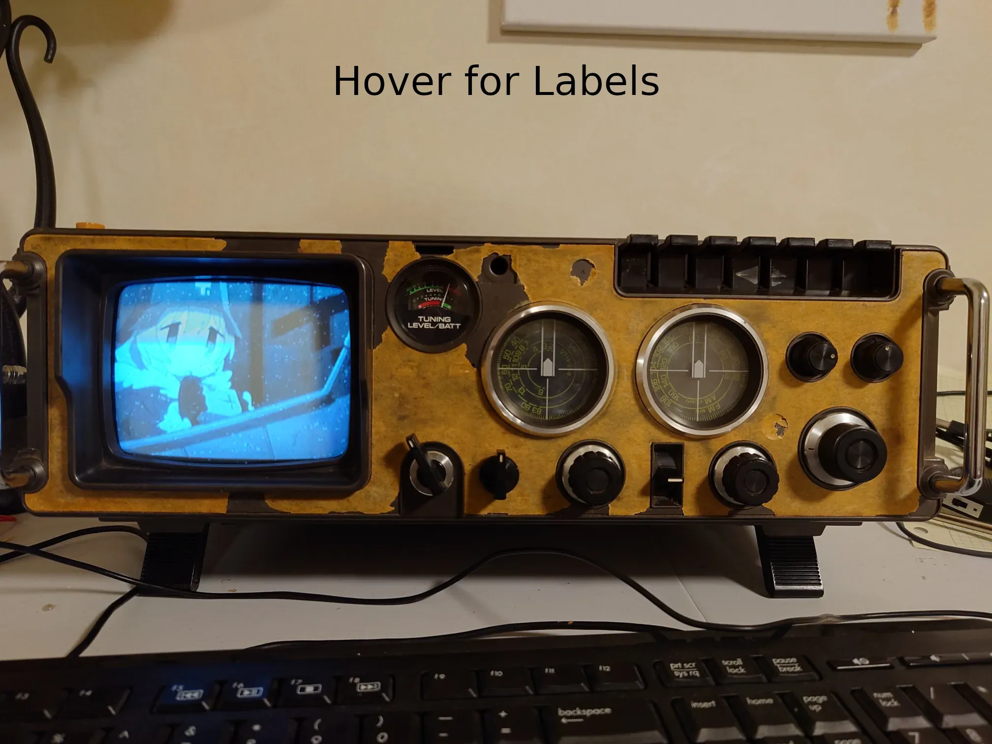 An anime playing on the black and white tv